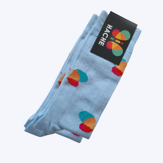 calcetín azul claro con mariposa a color